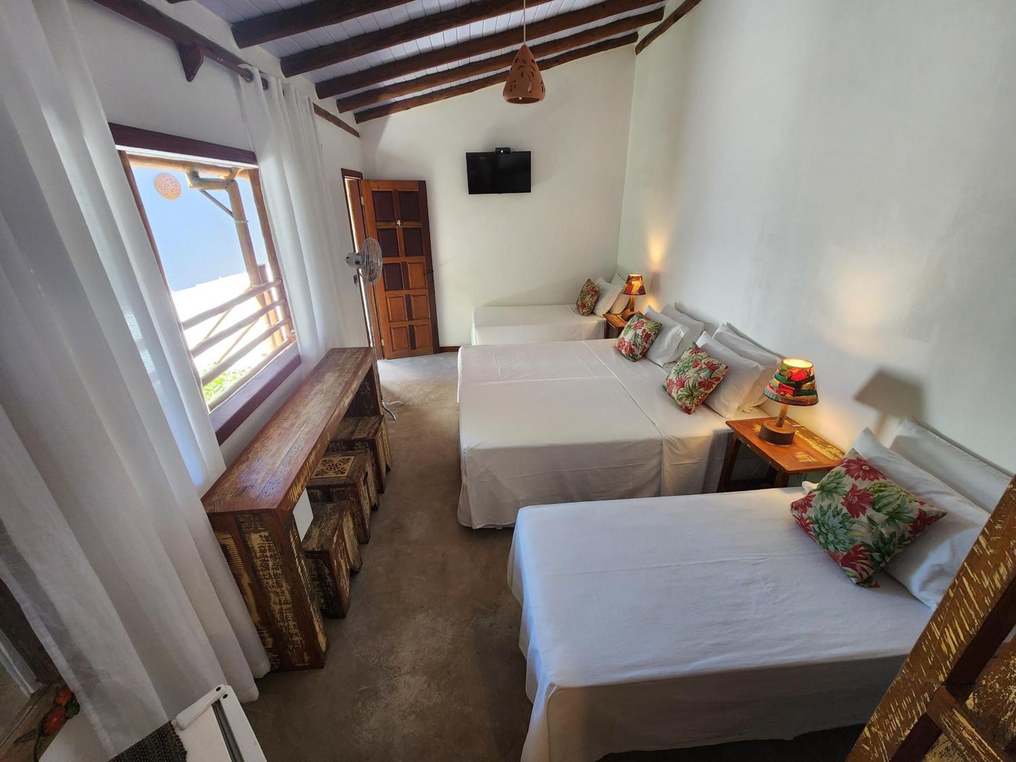 Хостел Casa De Paixao Карайва Номер фото